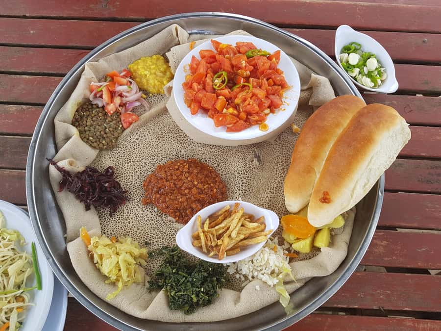 Addis Ababa Essentials: Flexible Full-Day City Sightseeing - Entoto Mountain, home cooking, and coffee