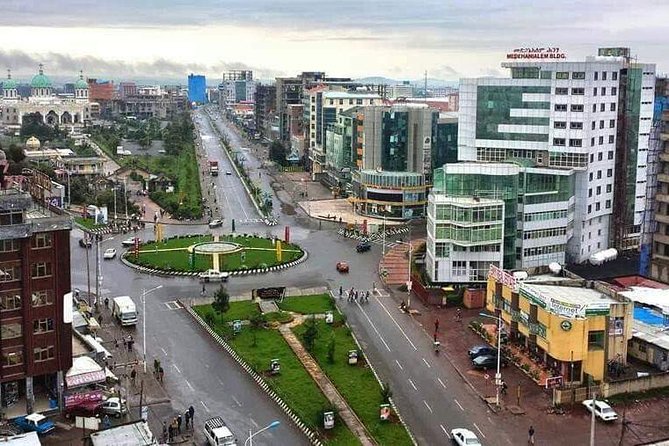 Airport Layover Tour | Half Day Addis City Tour : sightseeing, museum , markets - Shiromeda and Chiromeda Market for traditional clothing